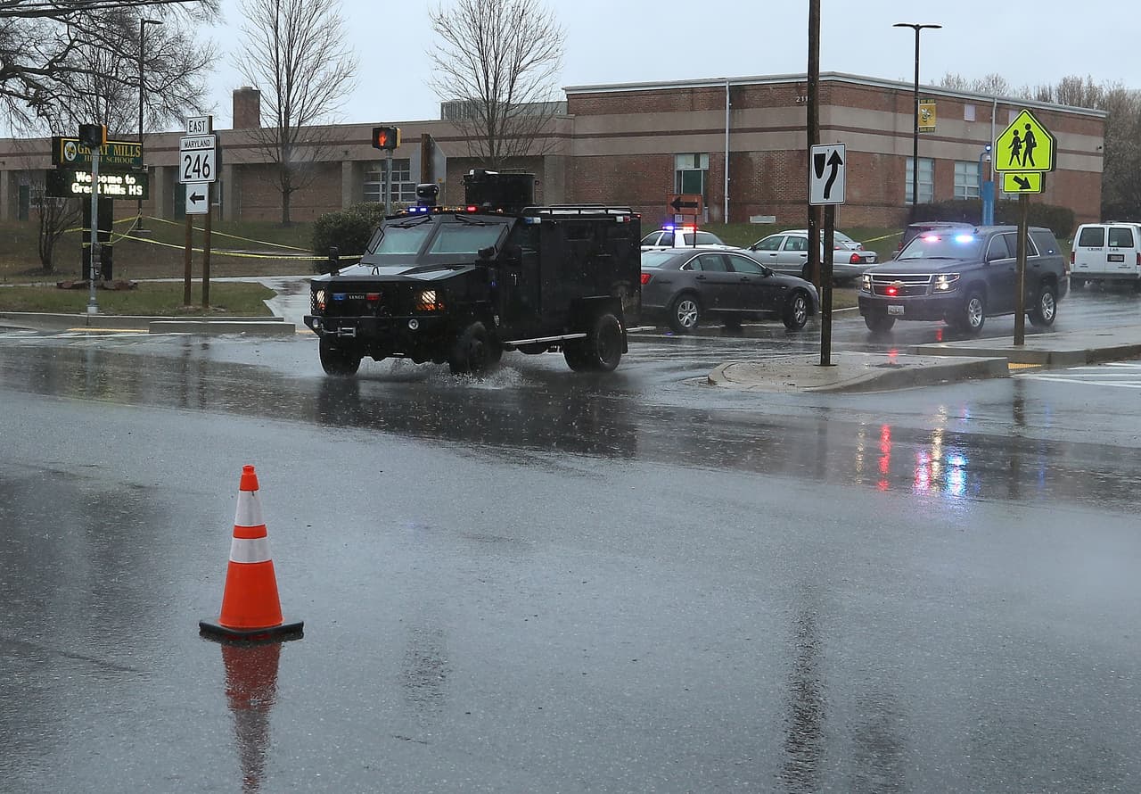 GREAT MILLS, MD - MARCH 20: Police vehicles pull out of Great Mills High School after a shooting on March 20, 2018 in Great Mills, Maryland. It was reported that two students at a Maryland high school were injured after a colleague opened fire in the hallway just before classes began. (Photo by Mark Wilson/Getty Images)