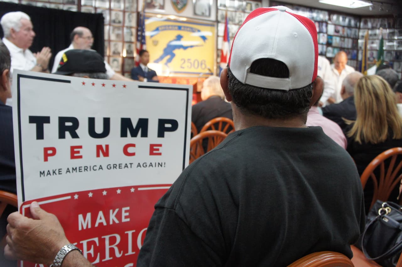 Roberto Suarez waits for Trump to step to the podium