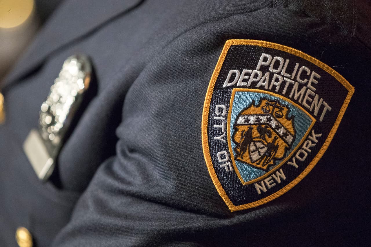 FILE - A New York Police Department patch is seen, June 29, 2017, in New York. (AP Photo/Mary Altaffer, File)