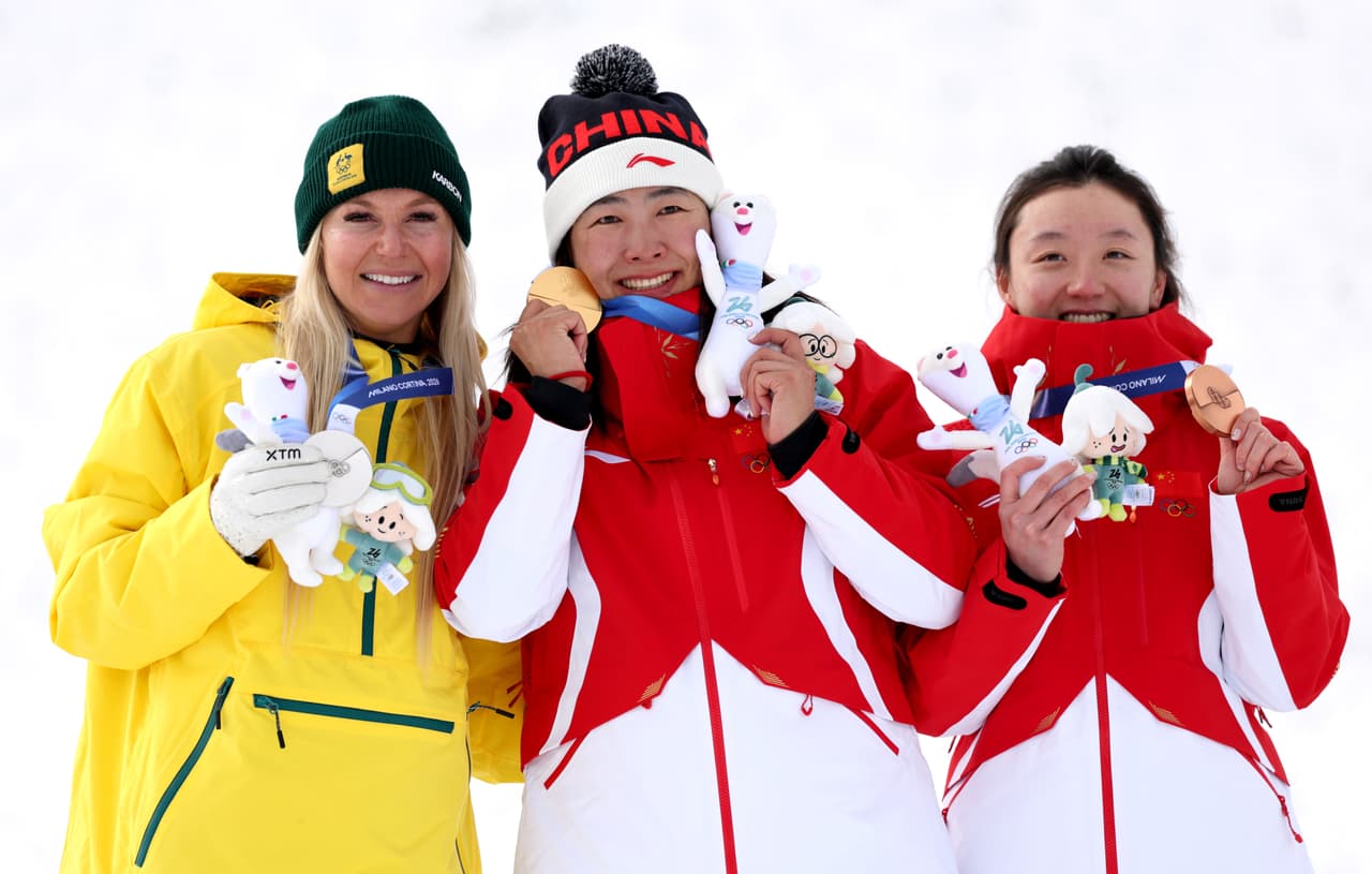 China logra 1-3 en el aerials, prueba reprogramada por nevadas