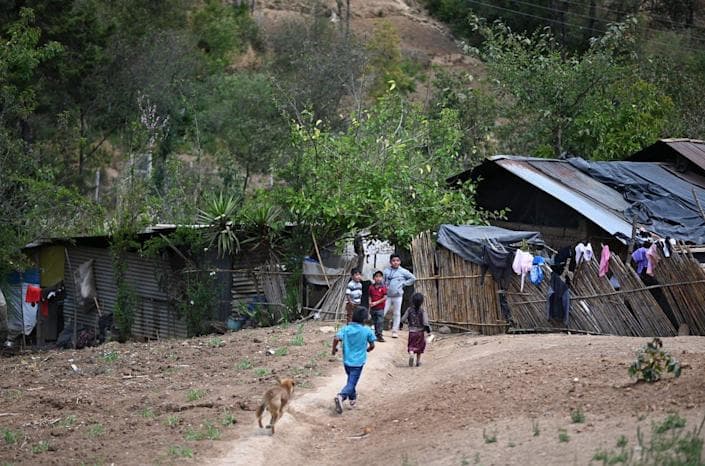 Children play in Las Flores village, Comitancillo, Guatemala, home of a 22-year-old migrant murdered in January 2021 on his journey through Mexico.