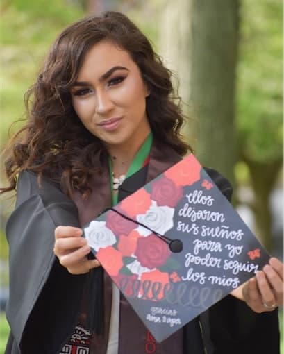 Graduation caps: Graduation caps. This one reads: "They left behind their dreams so that I could pursue mine. Thanks Mom and Dad."