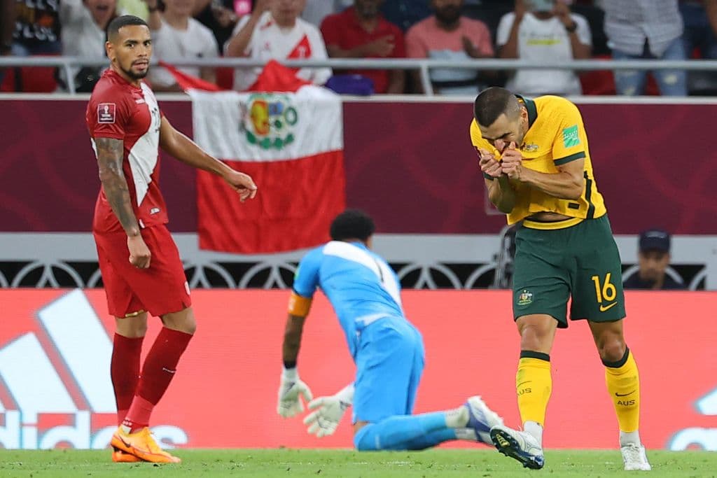 Australia's defender Aziz Behich (R) reacts after a missed chance during the FIFA World Cup 2022 inter-confederation play-offs match between Australia and Peru on June 13, 2022, at the Ahmed bin Ali Stadium in the Qatari city of Ar-Rayyan. (Photo by KARIM JAAFAR / AFP) (Photo by KARIM JAAFAR/AFP via Getty Images)