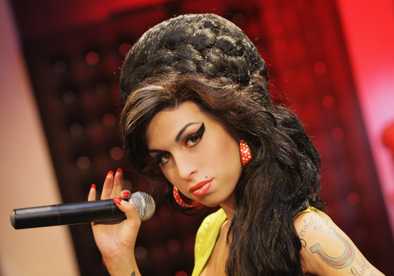 LONDON - JULY 23: A waxwork figure of Grammy Award winning singer Amy Winehouse is unveiled at Madame Tussauds on July 23, 2008 in London, England. (Photo by Dan Kitwood/Getty Images)