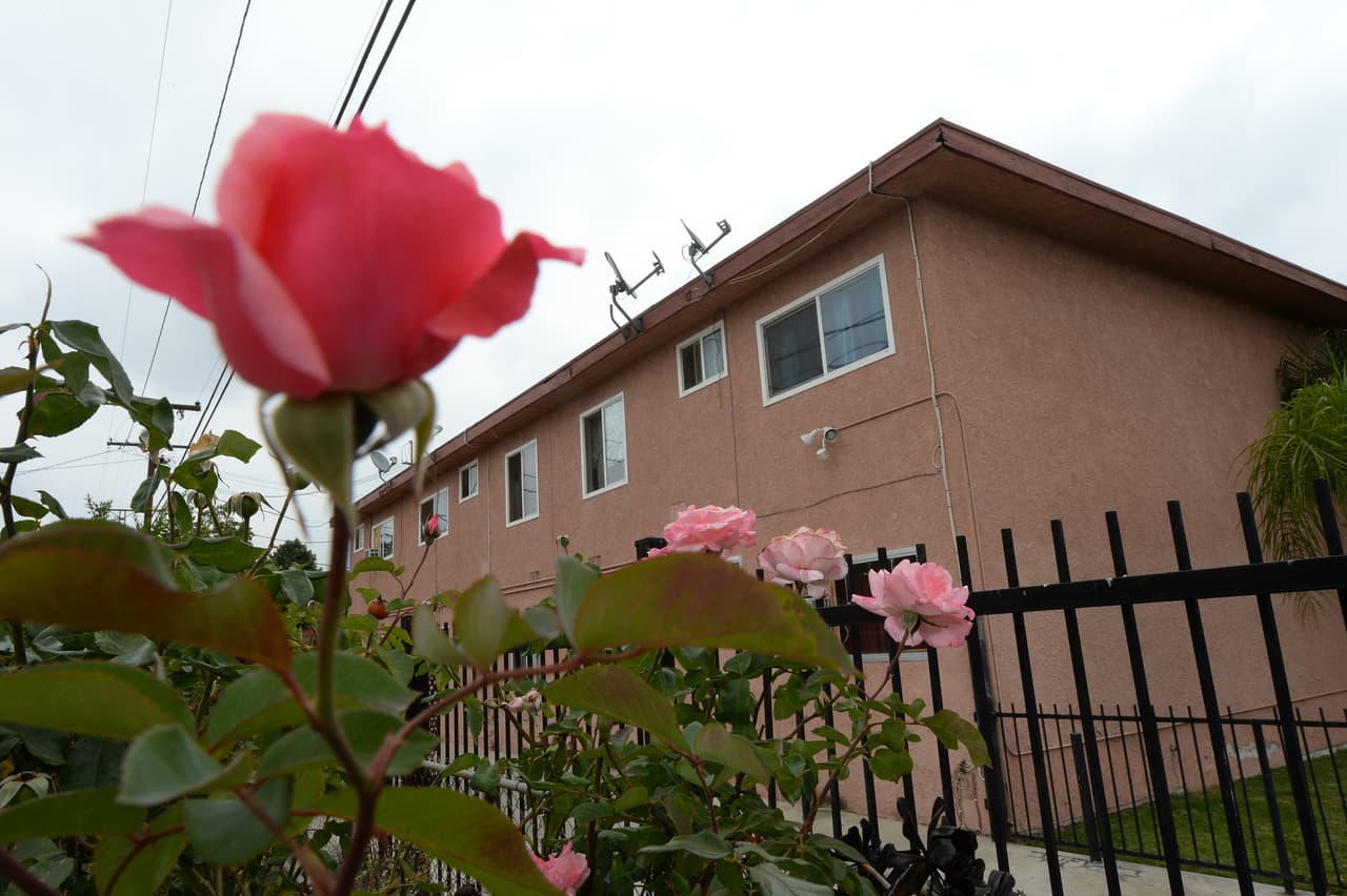 An exterior view of the apartment block where Isidro Garcia lived, in Bell Gardens, California is seen May 23, 2014. Garcia was arrested earlier in the week, accused of abducting a 15-year-old girl and holding her captive for a decade. Garcia, 42, was indicted a day after police announced that the woman, now aged 25, had come forward with a child fathered by Garcia, who allegedly forced her to marry him. He faces up to 19 years in jail if convicted. AFP PHOTO/ROBYN BECK (Photo credit should read ROBYN BECK/AFP/Getty Images)