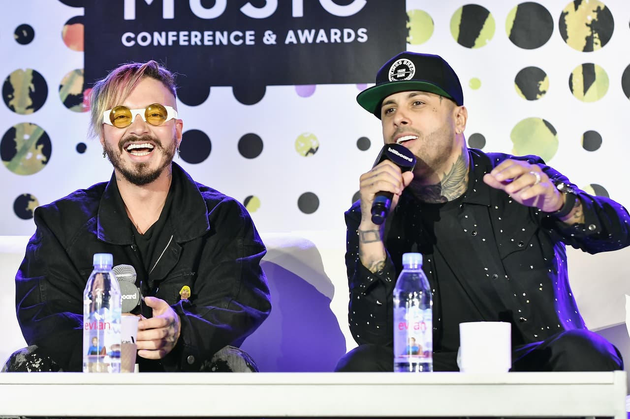 Reggaeton artists J Balvin and Nicky Jam speak at the Billboard Latin Conference 2017 at Ritz Carlton South Beach on April 26, 2017 in Miami Beach, Florida. The two are known for being very close friends. Together, they have recorded several songs, including 'Superhéroe' and 'X.'
