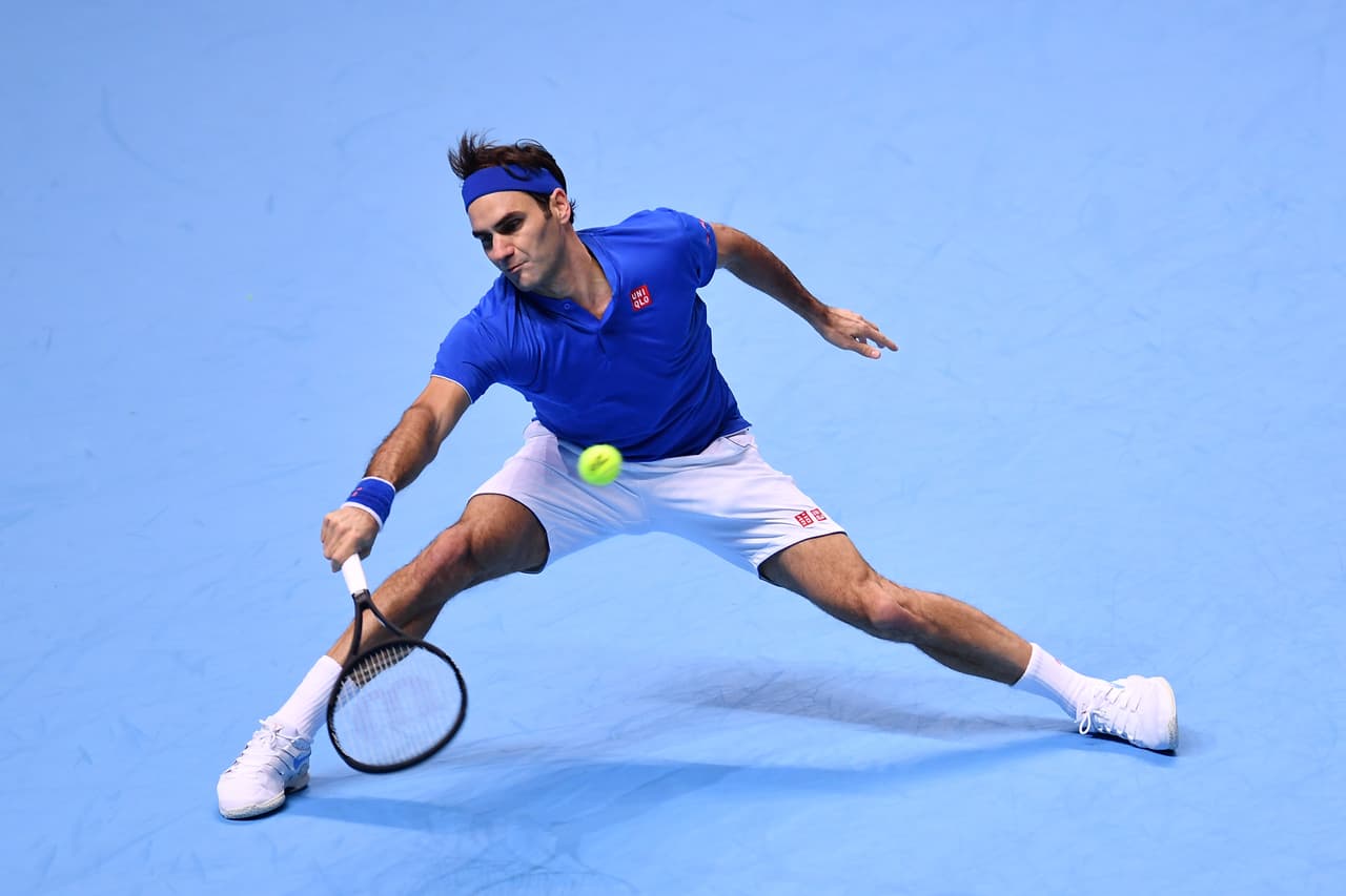 LONDON, ENGLAND - NOVEMBER 17: Roger Federer of Switzerland plays a forehand shot in his semi finals singles match against Alexander Zverev of Germany during Day Seven of the Nitto ATP Finals at The O2 Arena on November 17, 2018 in London, England. (Photo by Justin Setterfield/Getty Images)