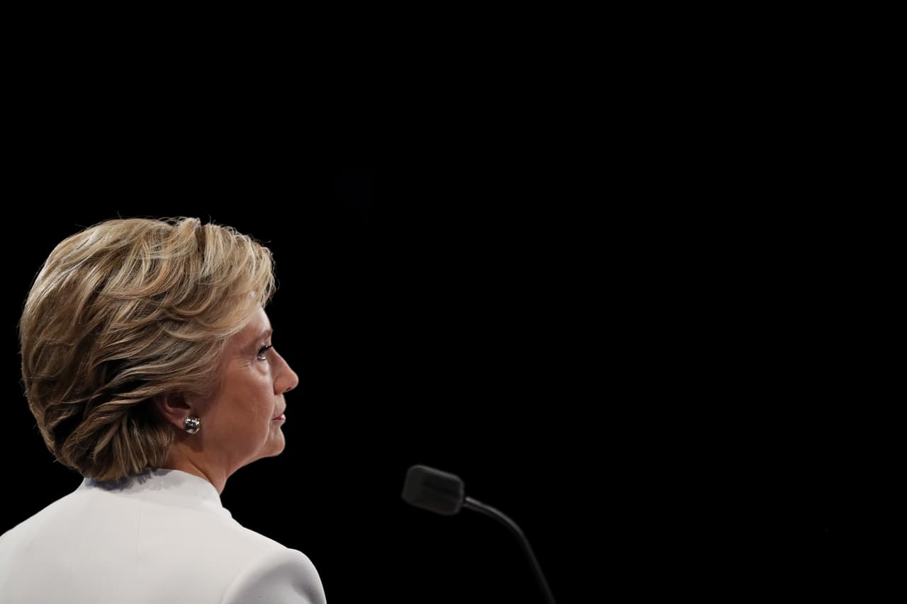 LAS VEGAS, NV - OCTOBER 19: Democratic presidential nominee former Secretary of State Hillary Clinton listens to Republican presidential nominee Donald Trump speak during the third U.S. presidential debate at the Thomas & Mack Center on October 19, 2016 in Las Vegas, Nevada. Tonight is the final debate ahead of Election Day on November 8. (Photo by Joe Raedle/Getty Images)
