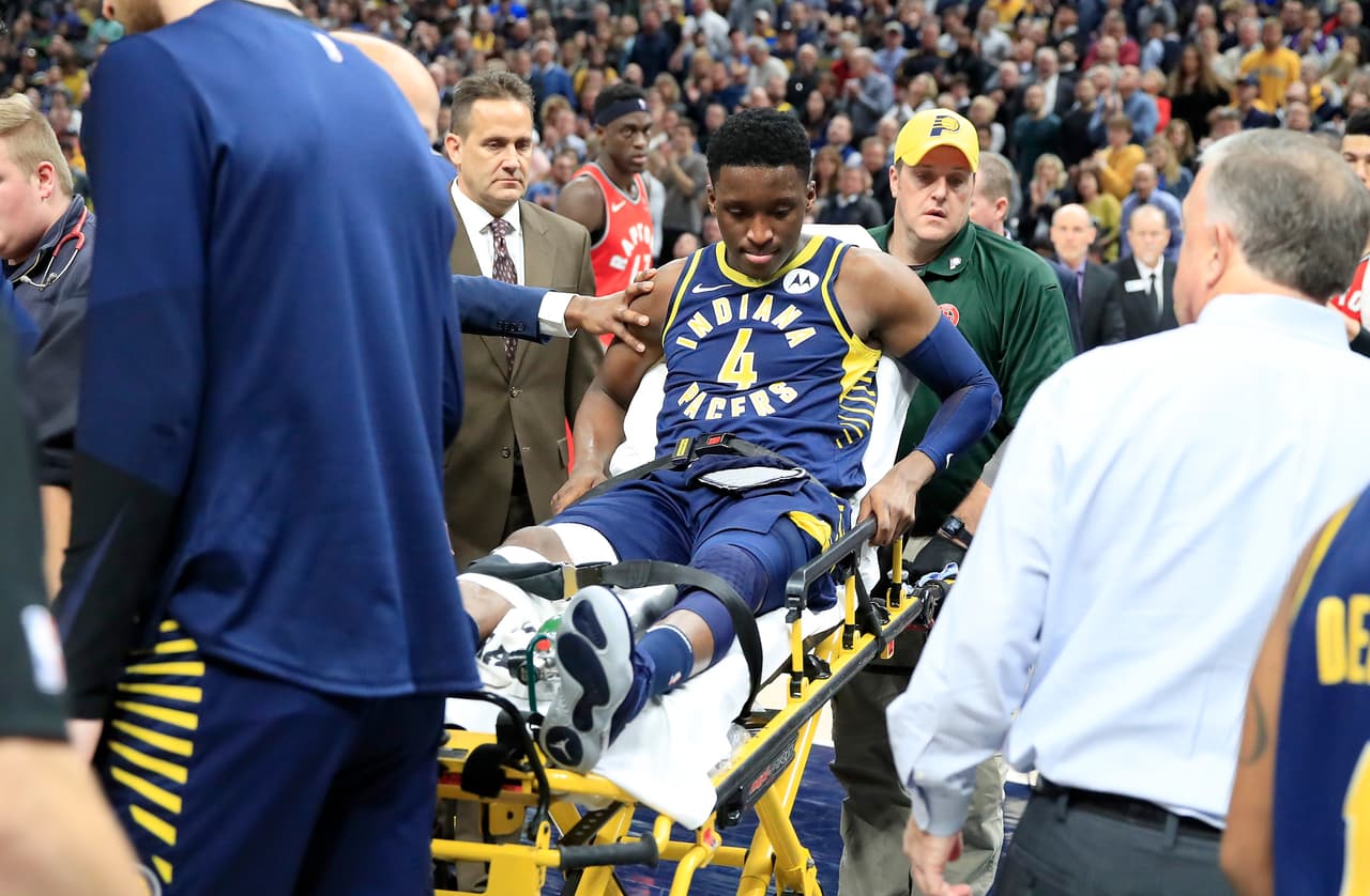 INDIANAPOLIS, INDIANA - JANUARY 23: Victor Oladipo #4 of the Indiana Pacers is taken off of the court on a stretcher after being injured in the second quarter of the game against the Toronto Raptors at Bankers Life Fieldhouse on January 23, 2019 in Indianapolis, Indiana. (Photo by Andy Lyons/Getty Images)