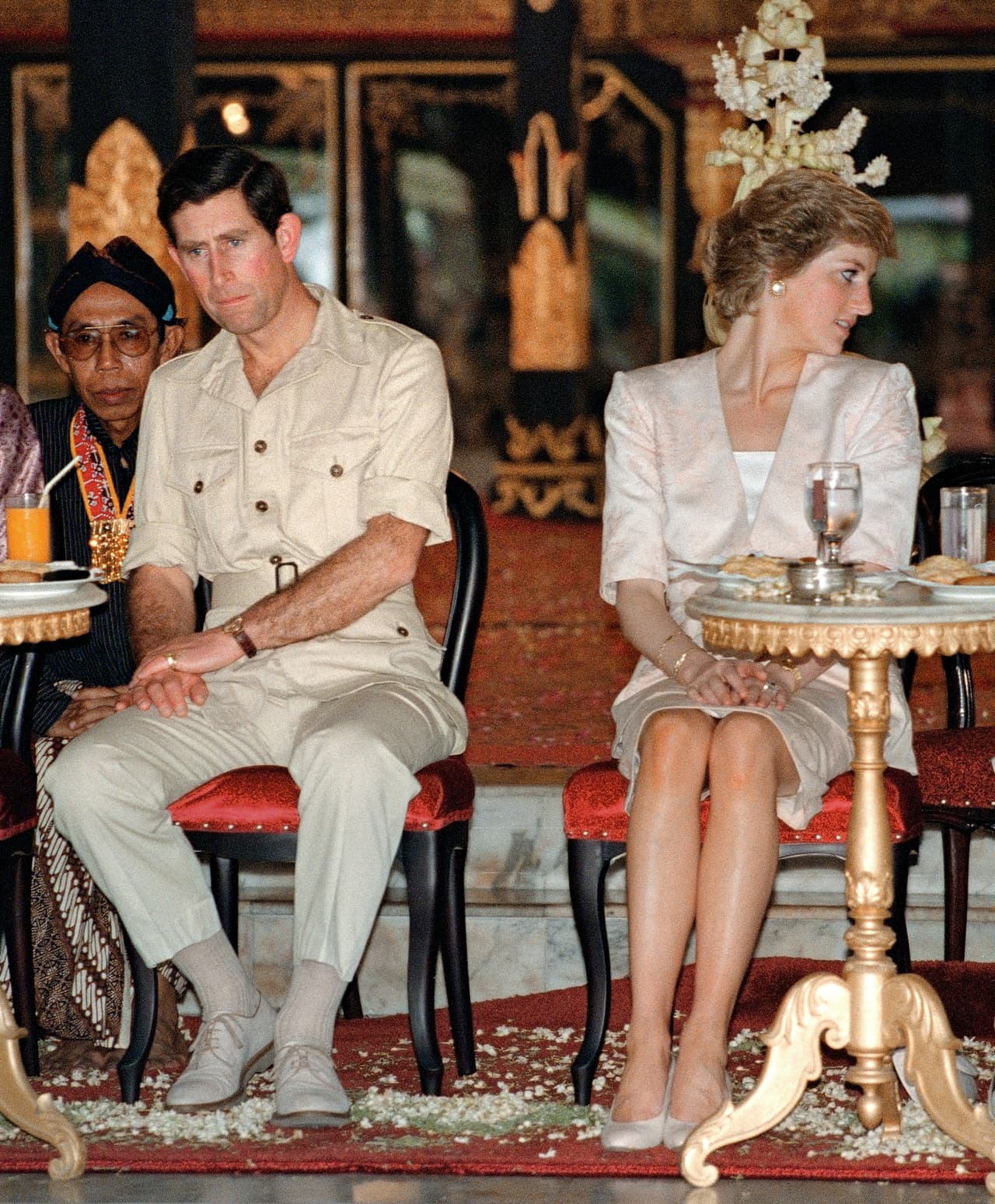 Prince and Princess of Wales watch 05 November 1989 Indonesian tribal dancers in Yogyakarta, Indoniesia. The Princess Diana announced 28 February that she has agreed to divorce Prince Charles and end their 14 year marriage. The couple have been separated for over three years. AFP PHOTO Kazuhiro NOGI / AFP PHOTO / KAZUHIRO NOGI (Photo credit should read KAZUHIRO NOGI/AFP/Getty Images)