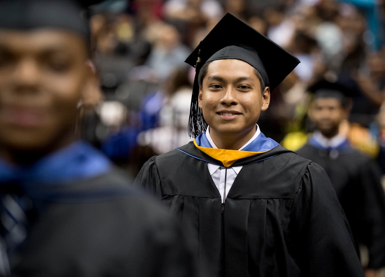 **COMMERCIAL IMAGE** In this photo taken by Feature Photo Service for IBM: 17-year-old Oscar Tendilla, who took just 3.5 years to complete a six-year, IBM-inspired program that confers both high school diplomas and associates degrees, graduated in a commencement exercise held by New York City College of Technology at Barclays Center in Brooklyn, NY on June 5, 2017. Oscar had attended P-TECH Brooklyn, a prototype that has grown into nearly 80 schools worldwide that provide technology-oriented workplace and classroom experience for New Collar -type jobs, or as the foundation for bachelors degrees. Tendilla, the first in his family to obtain a college degree, and who helped his mother successfully study for her own high school equivalency degree, is now headed to Cornell University. Approximately 100 students have already graduated so far from the original, IBM-affiliated P-TECH schools in Brooklyn and Chicago. (Jon Simon/Feature Photo Service for IBM)