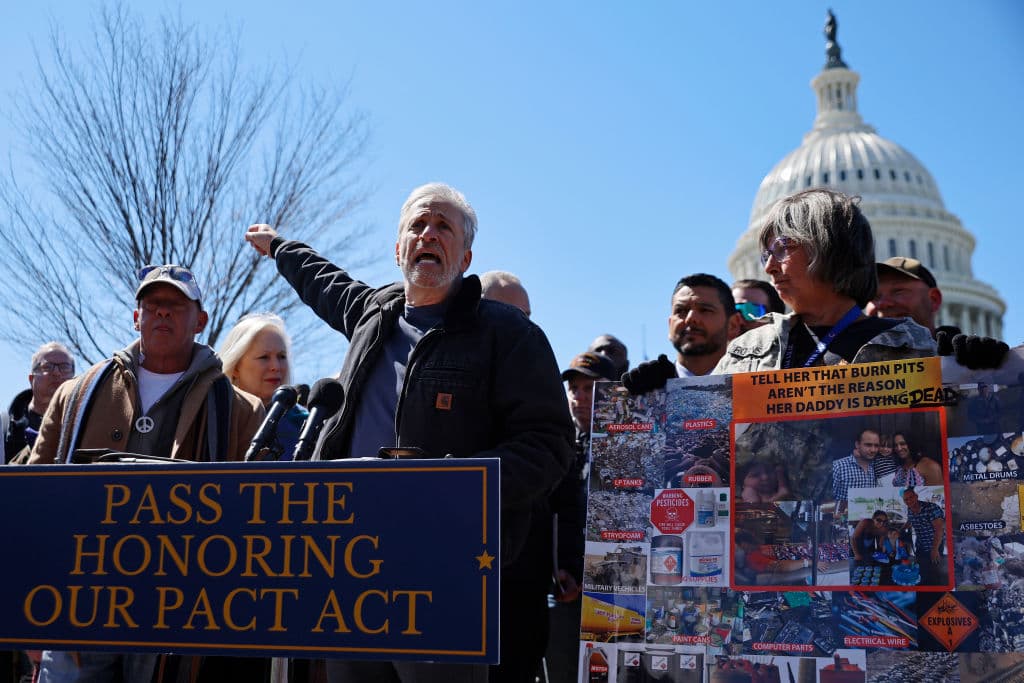 Comedian and activist Jon Stewart speaks during a news conference about military burn pits legislation with veterans advocacy groups and Democratic members of Congress outside the U.S. Capitol on March 29, 2022.
