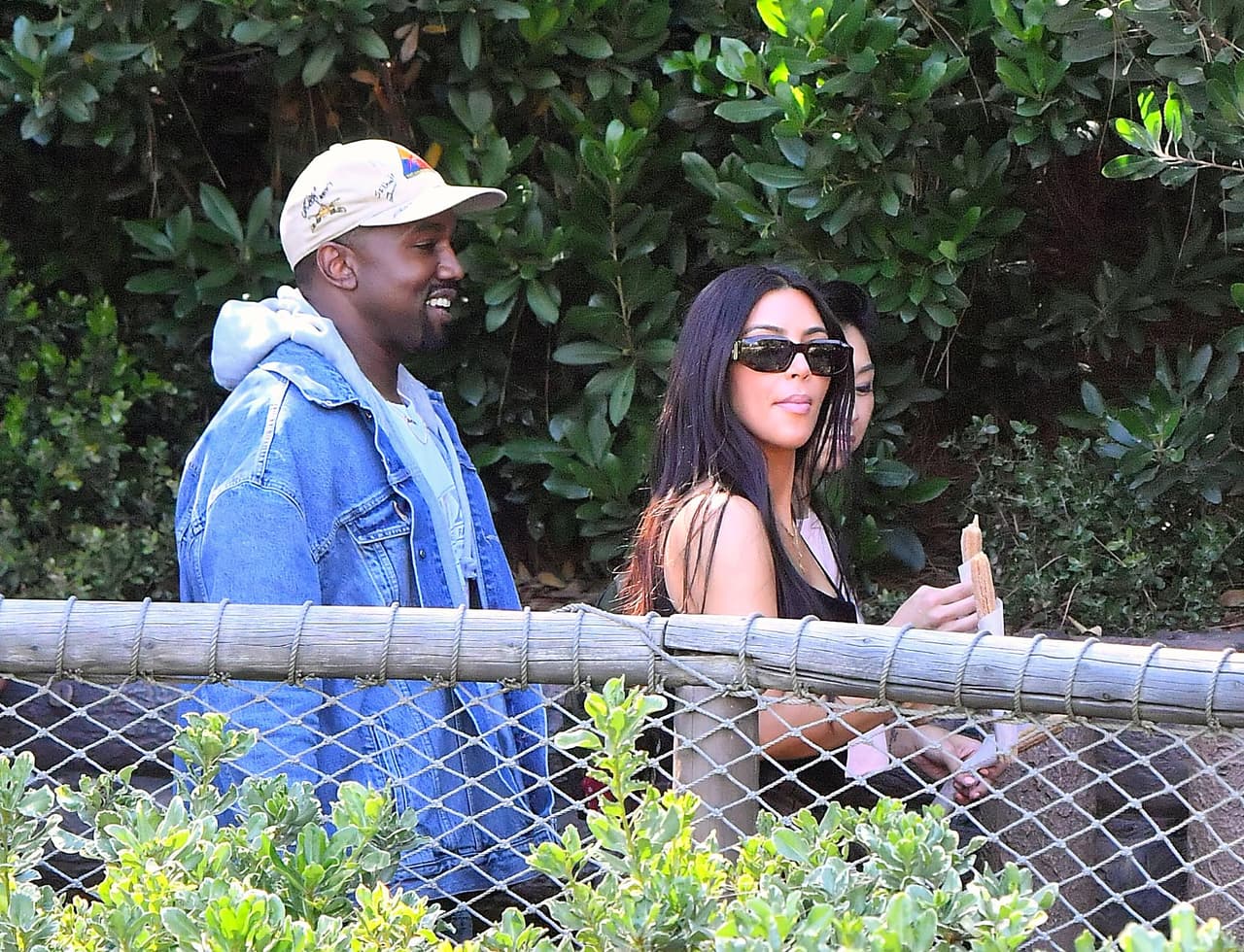 Photo © 2017 Splash News/The Grosby Group EXCLUSIVE Los Angeles, May 23, 2017. Kim Kardashian and Kanye West take their daughter and niece to the happiest place on earth, Disneyland. The group, joined by friends, were seen riding many rides including the teacups, Dumbo, Its a Small World, the gadget go coaster and many other rides on their trip. Kanye even cracked a smile on thunder mountain,