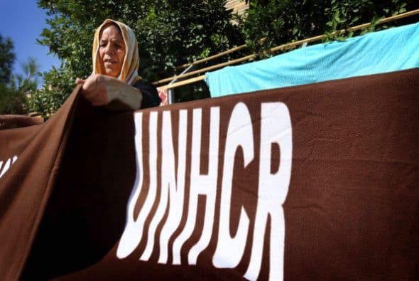 Los cristianos huyen de la violencia en Qaraqosh, la mayor ciudad iraquí.