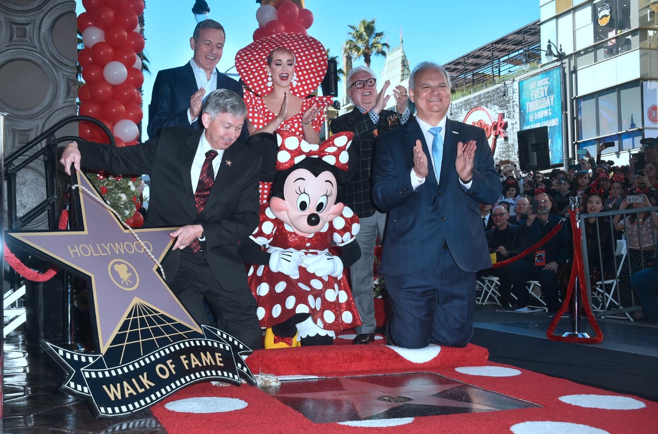 Minnie Mouse (C) is honored with the 2,627th star on the Hollywood Walk of Fame on January 22, 2018 in Hollywood, California, where she was joined by Disney CEO Bob Iger (top L), singer Katy Perry (top C), and President of the Hollywood Chamber of Commerce Leron Gubler (L). / AFP PHOTO / FREDERIC J. BROWN (Photo credit should read FREDERIC J. BROWN/AFP/Getty Images)