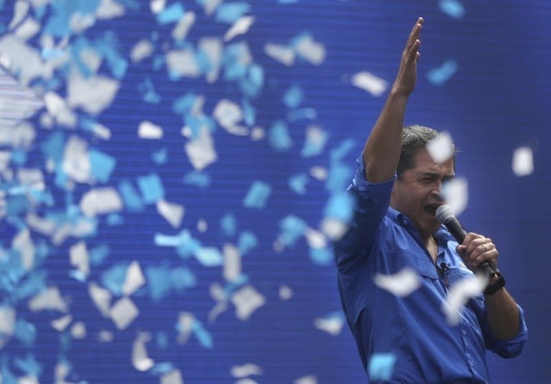Nov. 19, 2017 file photo, Honduran President Juan Orlando Hernandez speaks during his closing campaign rally, in Tegucigalpa, Honduras. Honduras’ electoral court has declared Hernandez the winner of the disputed election. Court president David Matamoros made the announcement Sunday evening after three weeks of uncertainty and violent protests in which at least 17 people died.