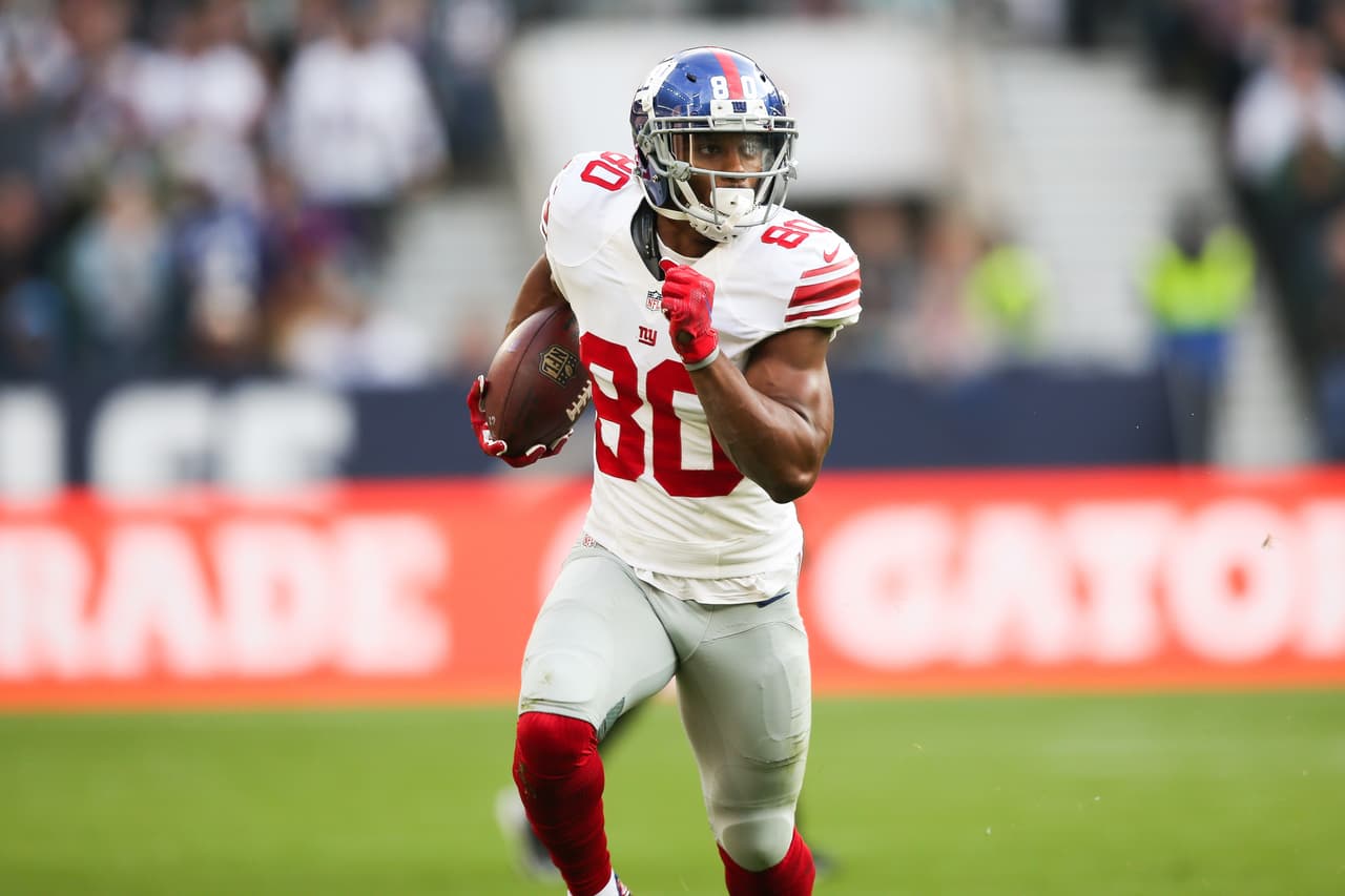 New York Giants wide receiver Victor Cruz (80) runs the ball during an NFL football game against the Los Angeles Rams at Twickenham Stadium on Sunday, Oct. 23, 2016 in London. (Ben Liebenberg via AP)