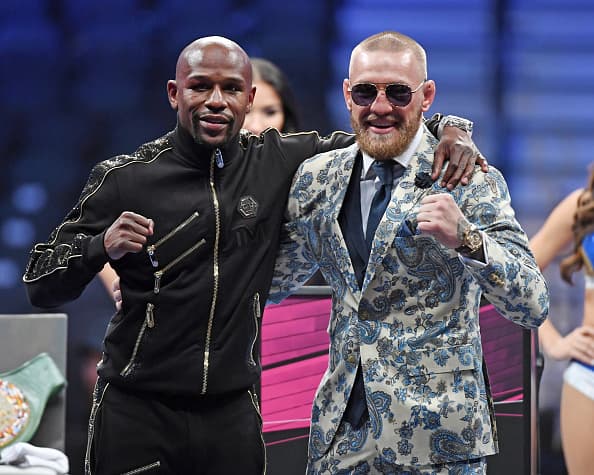 LAS VEGAS, NV - AUGUST 26: Floyd Mayweather Jr. (L) and Conor McGregor pose for pictures during a news conference after Mayweather's 10th-round TKO victory in their super welterweight boxing match on August 26, 2017 at T-Mobile Arena in Las Vegas, Nevada. (Photo by Ethan Miller/Getty Images)