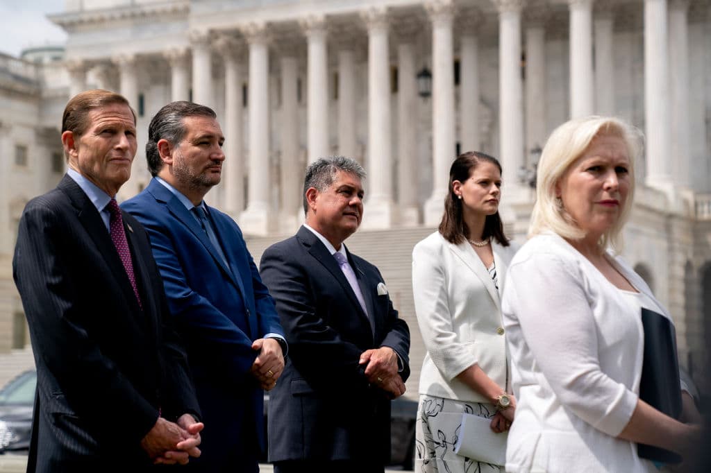 (L-R) U.S. Sen. Richard Blumenthal (D-CT), U.S. Sen. Ted Cruz (R-TX), executive vice president of Iraq and Afghanistan Veterans of America Tom Porter, sexual assault victim Amy Marsh, and U.S. Sen. Kirsten Gillibrand (D-NY) listen during a news conference outside the U.S. Capitol on April 29, 2021 in Washington, DC. to announce the Military Justice Improvement and Increasing Prevention Act.