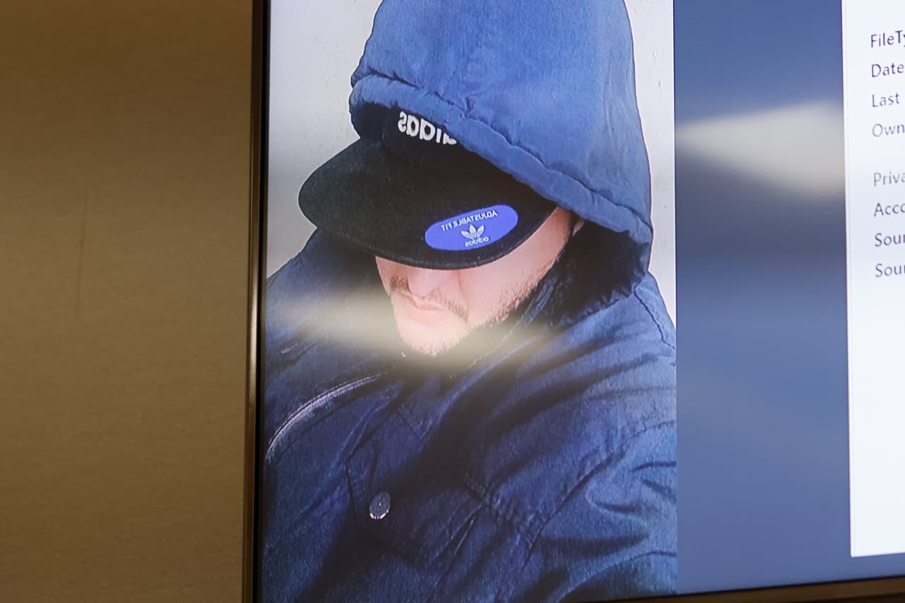 An image displayed on a screen shows Jose Ibarra, who was seen wearing a hat that led the police to his arrest during the second day of his trial at the Athens-Clarke County Superior Court on Monday, Nov. 18, 2024, in Athens, Ga. (Miguel Martinez/Atlanta Journal-Constitution via AP, Pool)