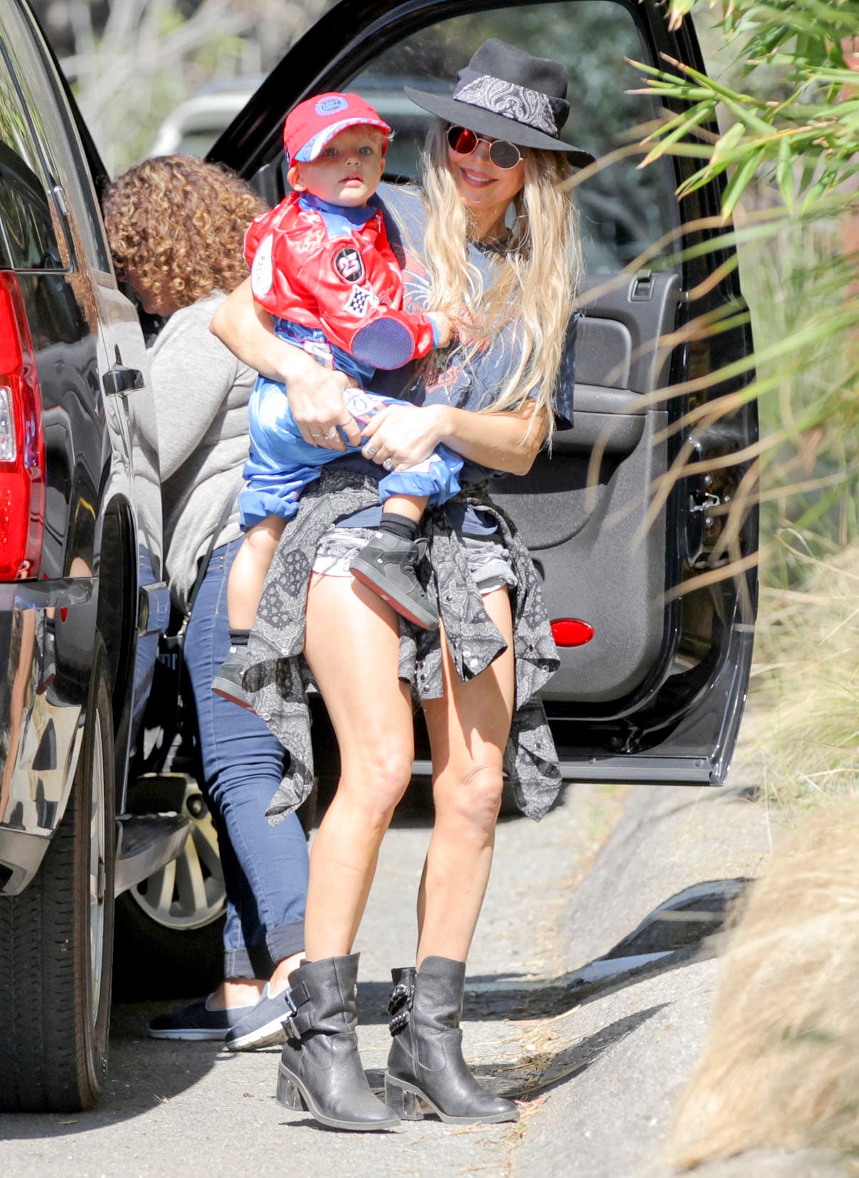 En algún momento Fergie lo cargó y él ya no quería soltarse de sus brazos.