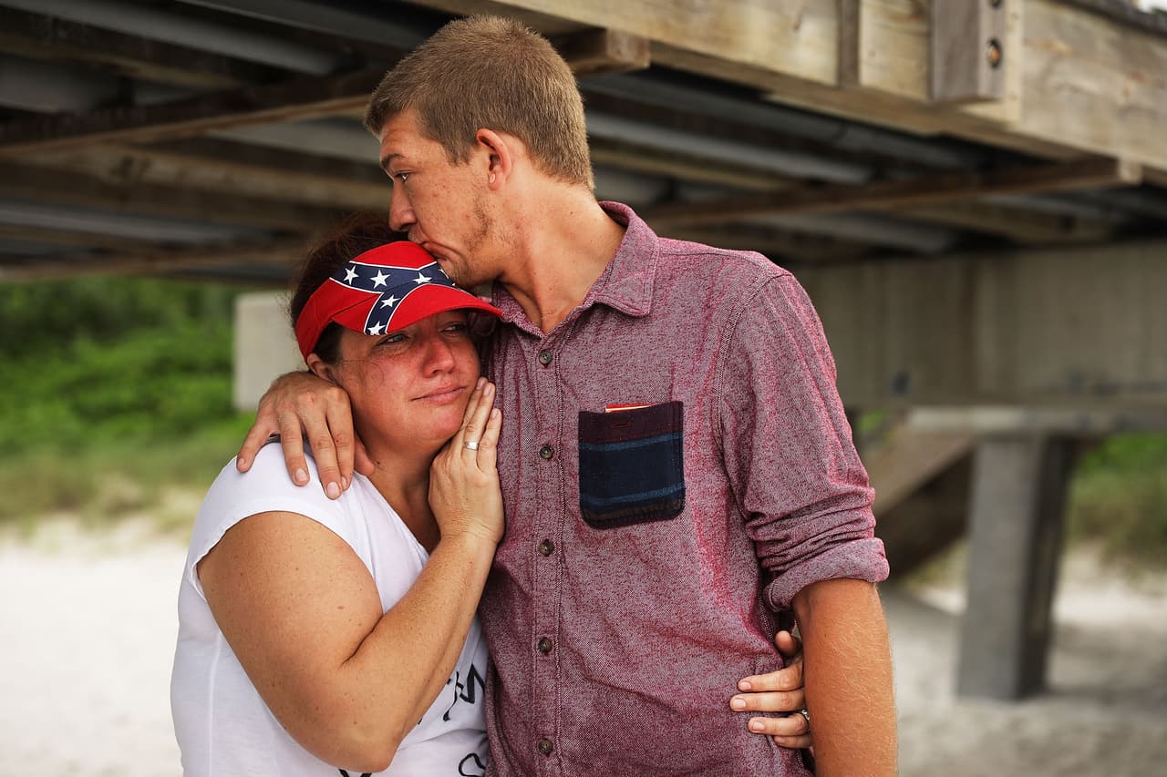 Jordan Alvarez embraces his mother Katie on a beach in the city of Naples, Florida, on the west coast of the state.