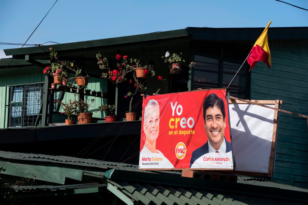 An election campaign billboard shows the presidential candidate of the Citizen Action Party (PAC), Carlos Alvarado, on February 1, 2018 in San Jose, ahead of the February 4 presidential elections. Costa Ricans will go to the polls on February 4 to elect their next president, in a climate of uncertainty in which nearly half of the population remains undecided and the candidate with the most support in the polls is far from the minimum 40 percent needed to win in the first round. / AFP PHOTO / Ezequiel BECERRA (Photo credit should read EZEQUIEL BECERRA/AFP/Getty Images)