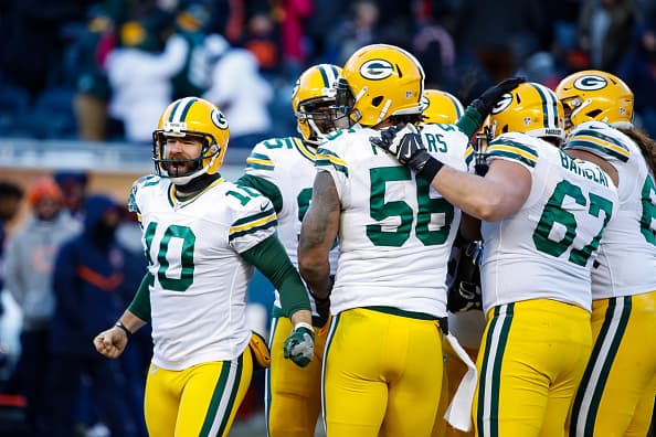 CHICAGO, IL - DECEMBER 18: Jacob Schum #10 of the Green Bay Packers (left) reacts after the Green Bay Packers beat the Chicago Bears at Soldier Field on December 18, 2016 in Chicago, Illinois. The Green Bay Packers defeated the Chicago Bears 30-27. (Photo by Joe Robbins/Getty Images)