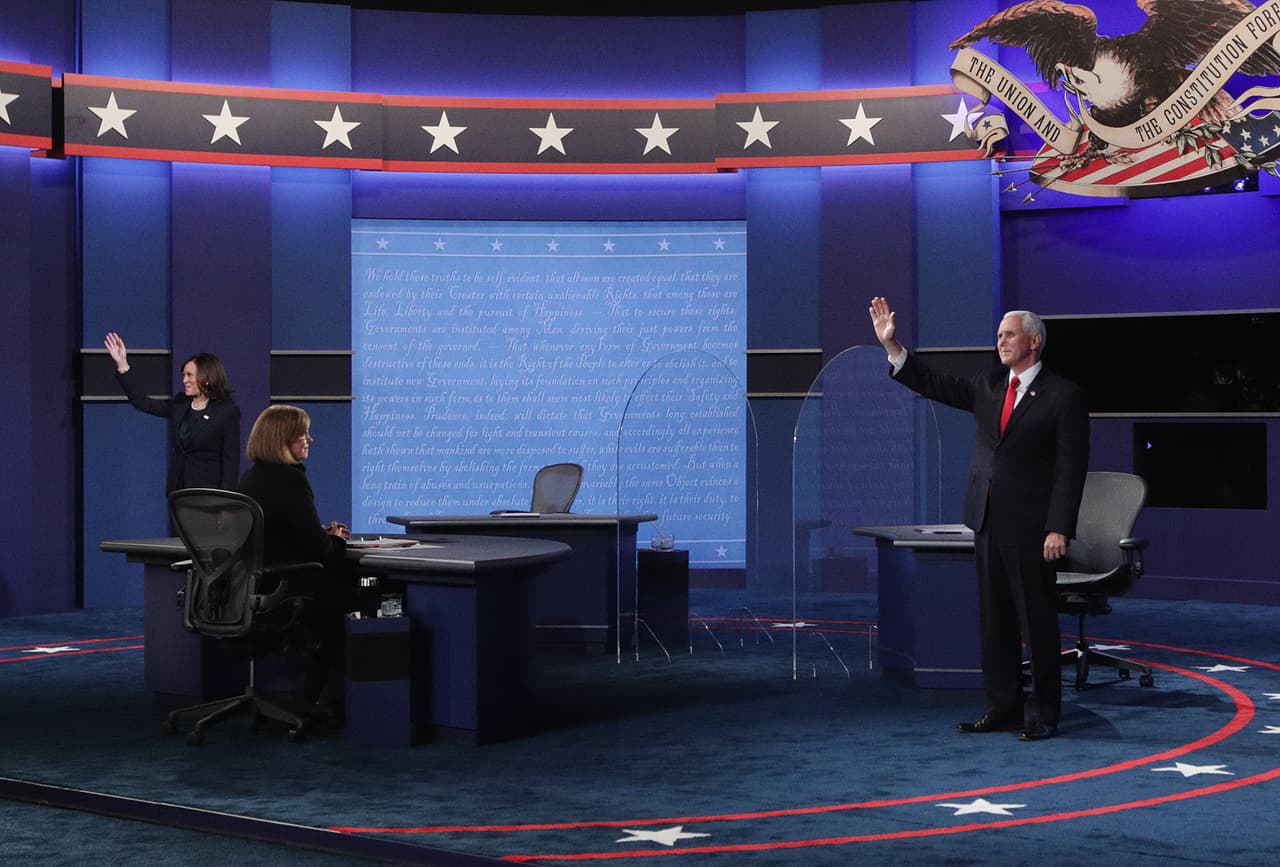 La entrada del vicepresidente republicano Mike Pence y la senadora demócrata Kamala Harris a su debate Salt Lake City, Utah. La discusión de 90 minutos continuos trató sobre nueve distintos aspectos de la realidad nacional e internacional.