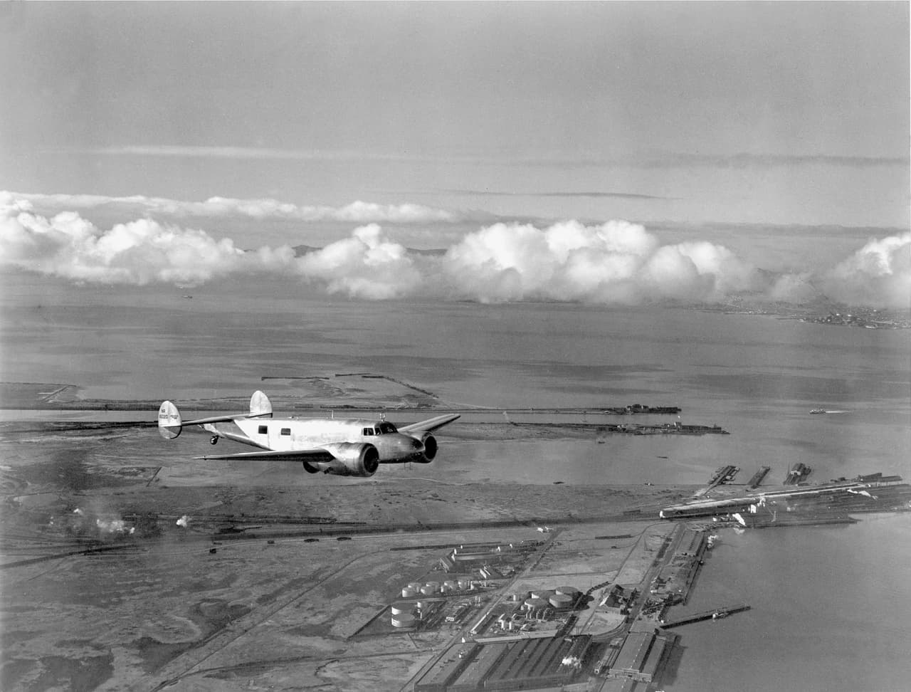 Amelia Earhart takes the $80,000 flying laboratory for a trial run over San Francisco Bay, Oakland, Ca., March 13, 1937, for her around-the-world flight.