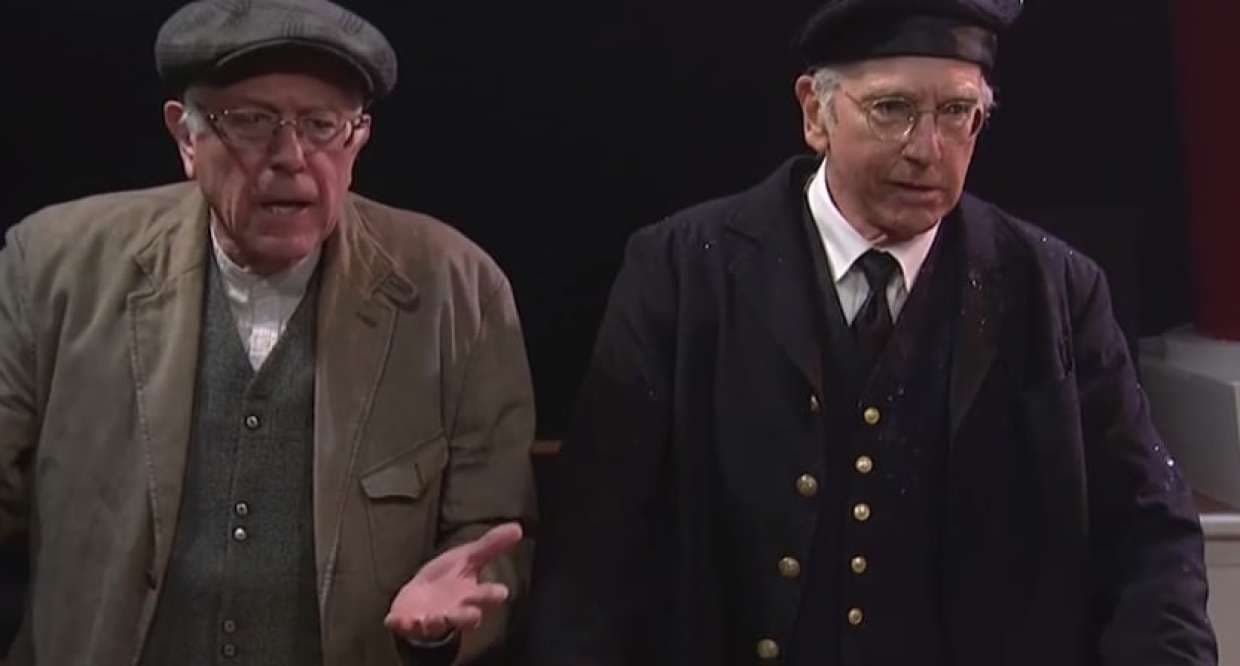 <b>Bernie habla con Bernie - </b>En febrero,
<b><a href="http://www.univision.com/personas-bernie-sanders" target="_blank">Bernie Sanders</a></b> hizo su debut en el show
<i>Saturday Night Live,</i> cara a cara con su "doble", el comediante y actor Larry David, cuya imitación había sido elogiada hasta por el mismo Sanders. En medio de una escenografía de la película de Titanic, Sanders apareció ayudando a poner orden entre los pasajeros a bordo del barco. David caracterizó a un pasajero disgustado por la preferencia dada a las mujeres y los niños.