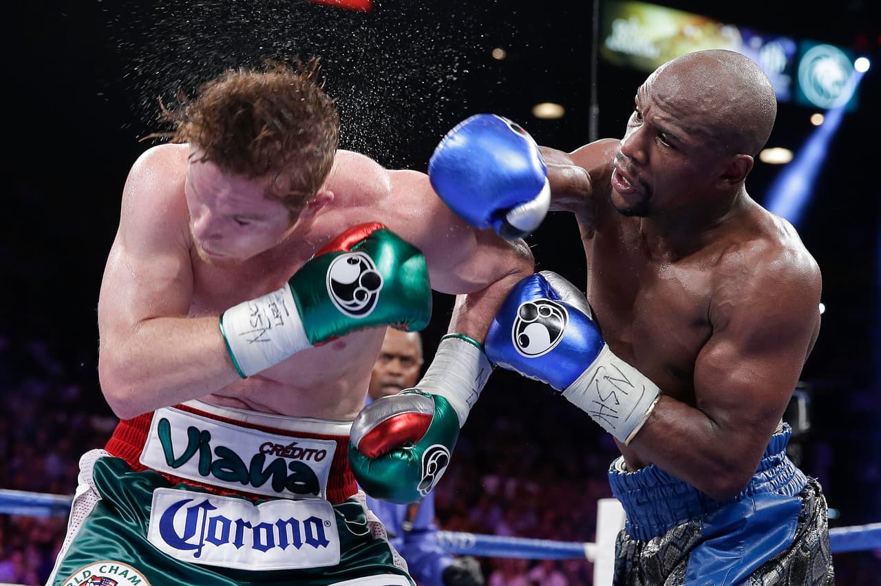 ¡Gancho al 5 de mayo! Mayweather presume triunfos ante Márquez y Canelo