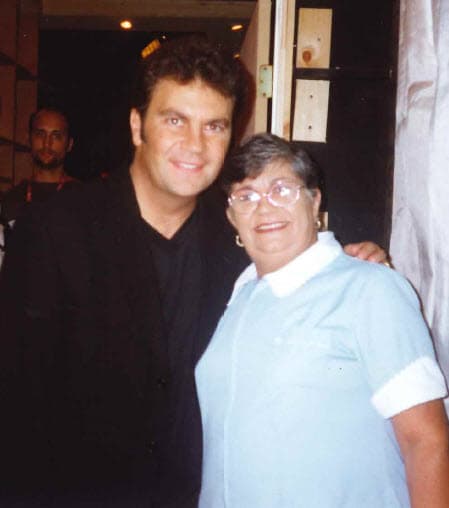 Con el cantante Manuel Mijares.