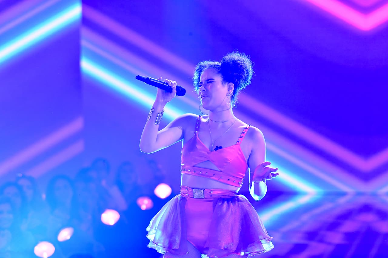 La participante que heredó de su mamá su pasión por la música volvió a sorprender a todos cuando hizo suya la parte en que el tema original dice: "Queen Nicki dominant, prominent It's me, Jessie, and Ari If they test me" y mencionó "Olga and Natti".