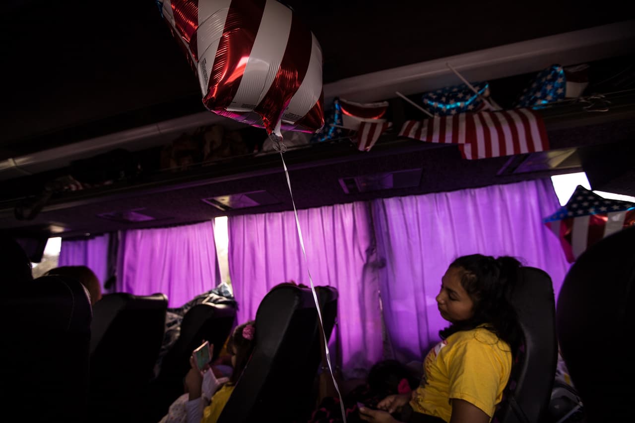 Immigrants traveled by bus to join protests outside the Supreme Court on Monday