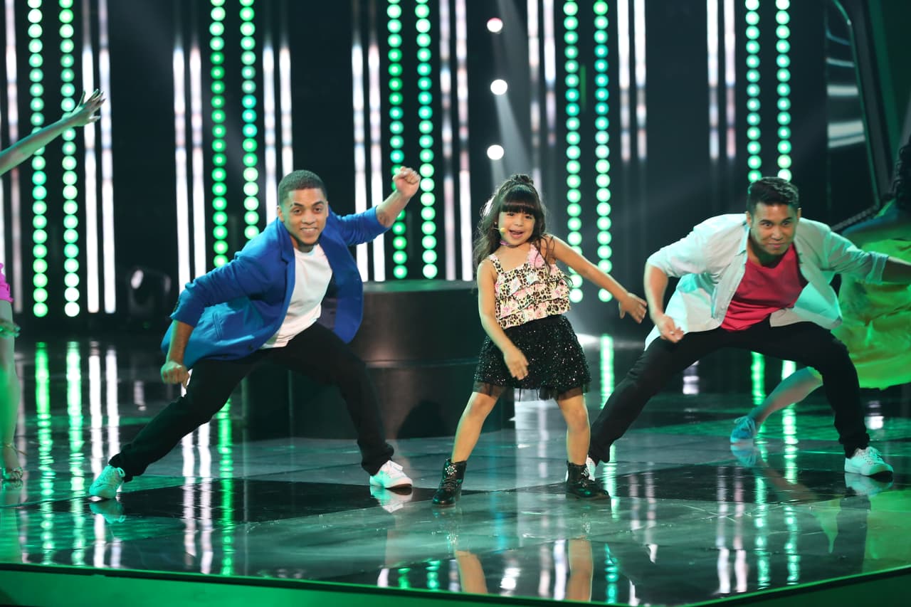 La primera presentación que hizo Giuliana fue una imitación de Olga Tañón.