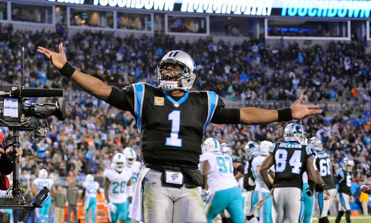 Carolina Panthers' Cam Newton (1) celebrates a touchdown pass against the Miami Dolphins in the second half of an NFL football game in Charlotte, N.C., Monday, Nov. 13, 2017. (AP Photo/Mike McCarn)
