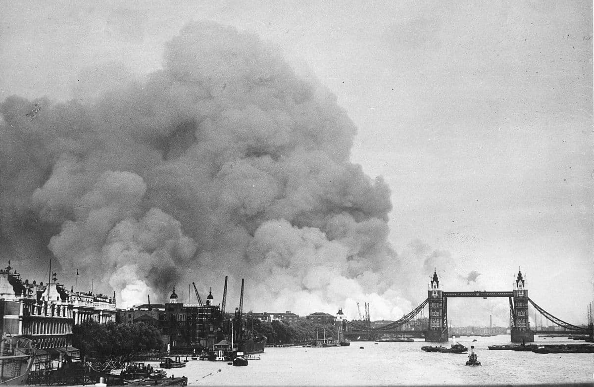View along the River Thames in London towards the smoke rising from London Docks after a German air raid during the 'Blitz'. September 7, 1940.