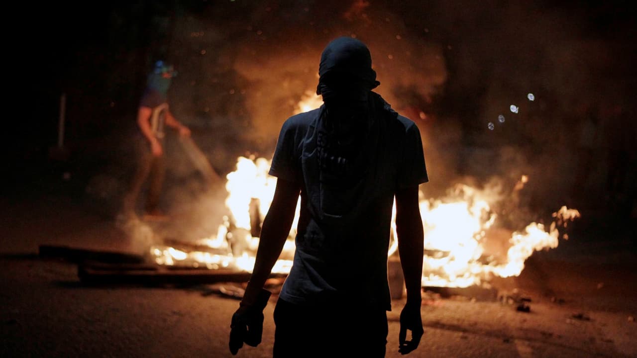 Los resultados de las elecciones hondureñas no son legítimos, dicen analistas, y la OEA llama a nuevos comicios