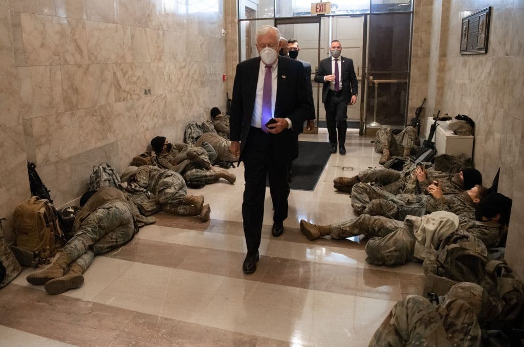 House Majority Leader Steny Hoyer, Democrat of Maryland, walks past members of the National Guard as he arrives at the US Capitol in Washington, DC, January 13, 2021, ahead of an expected House vote impeaching US President Donald Trump.