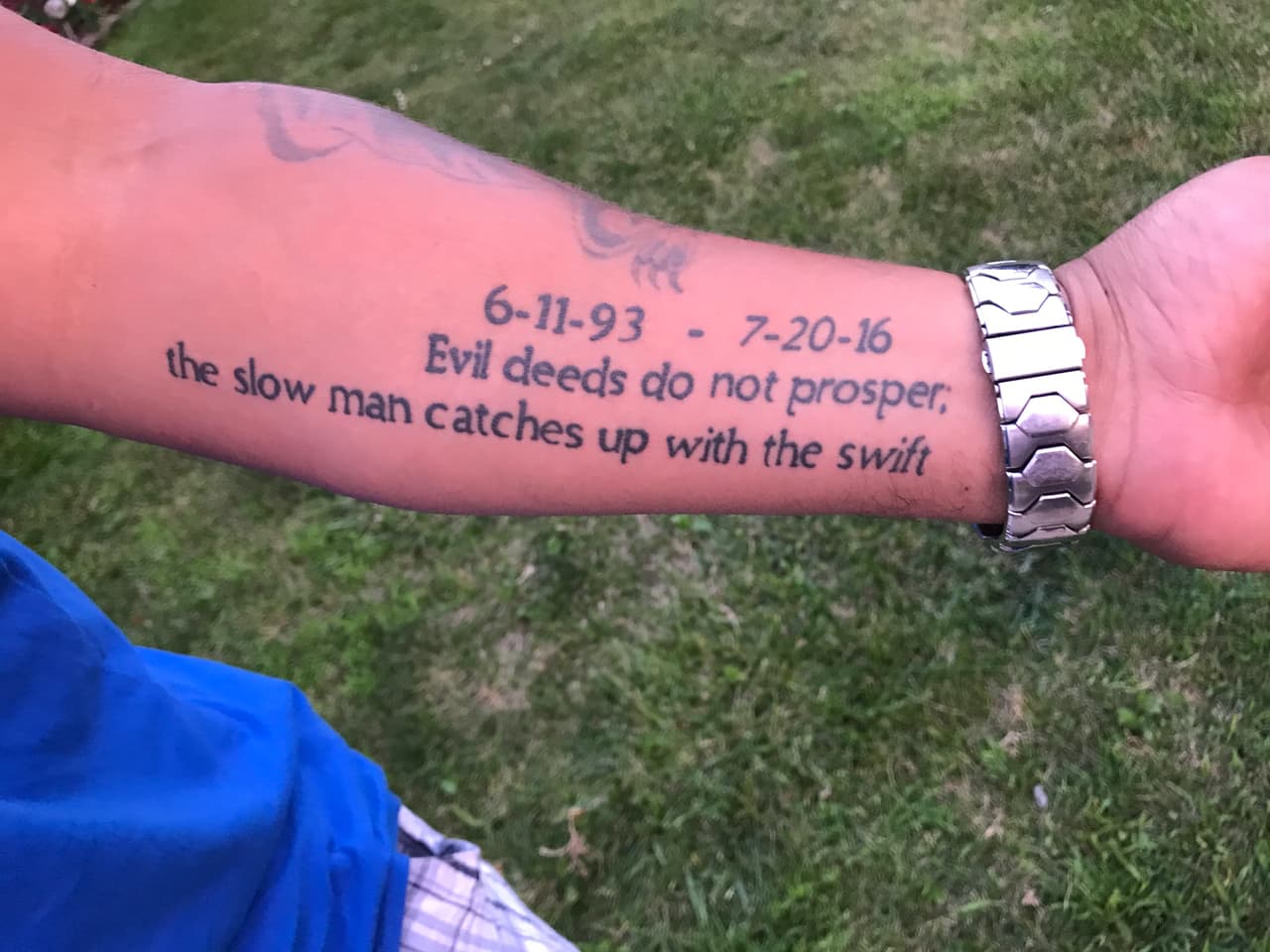 Tattoo on exonerated man in Chicago. He got the tattoo after learning he would be released. He and his lawyer have the same tattoo to remind them that although justice sometimes takes time, ill deeds never proper.