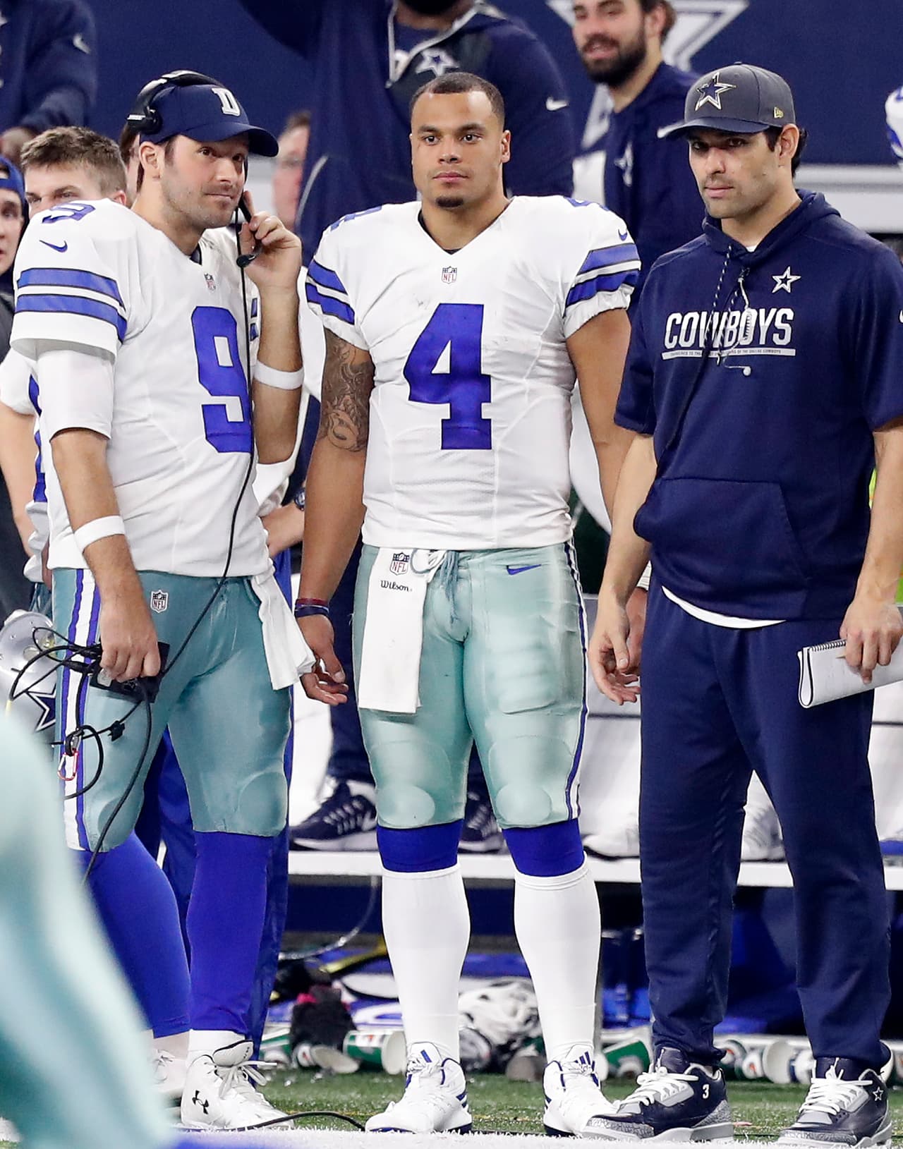 Dallas Cowboys quarterback Dak Prescott (4) confers with quarterback Tony Romo (9) on the sideline during an NFL NFC Divisional Playoff Game against the Green Bay Packers on Sunday, January 15, 2017. The Packers defeated the Cowboys 34-31. (Kevin Terrell via AP)