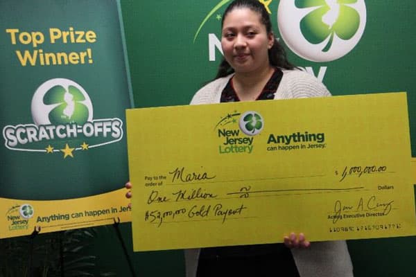 María López se llevó una gran sorpresa al raspar su boleto y hallarse ganadora del premio mayor.