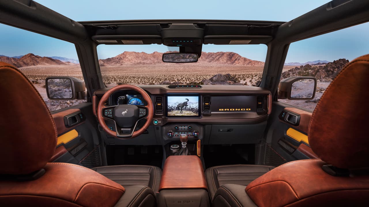 Prototype version, not representative of production model, of the all-new 2021 Bronco interior is highlighted by an available 12-inch SYNC® 4 system, optional leather trim seating, console-mounted transmission shifter/selector and G.O.A.T. Modes™ control knob. (Static display on private property with aftermarket accessories not available for sale.)