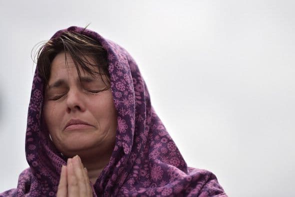 La emoción fue uno de los ingredientes de la celebración. Para muestra, el rostro de esta mujer.