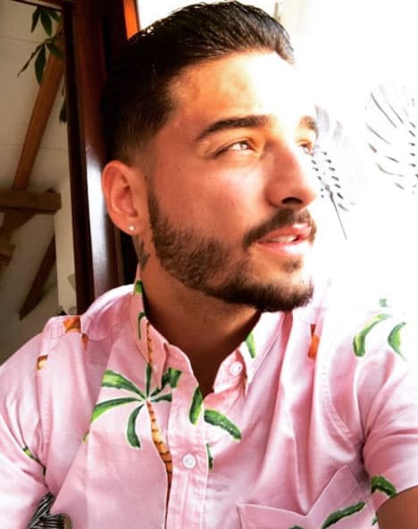 Sin embargo el llamado 'Pretty Boy' comenzó a dejarse crecer el cabello y peinarlo con bastante gel hacia atrás.