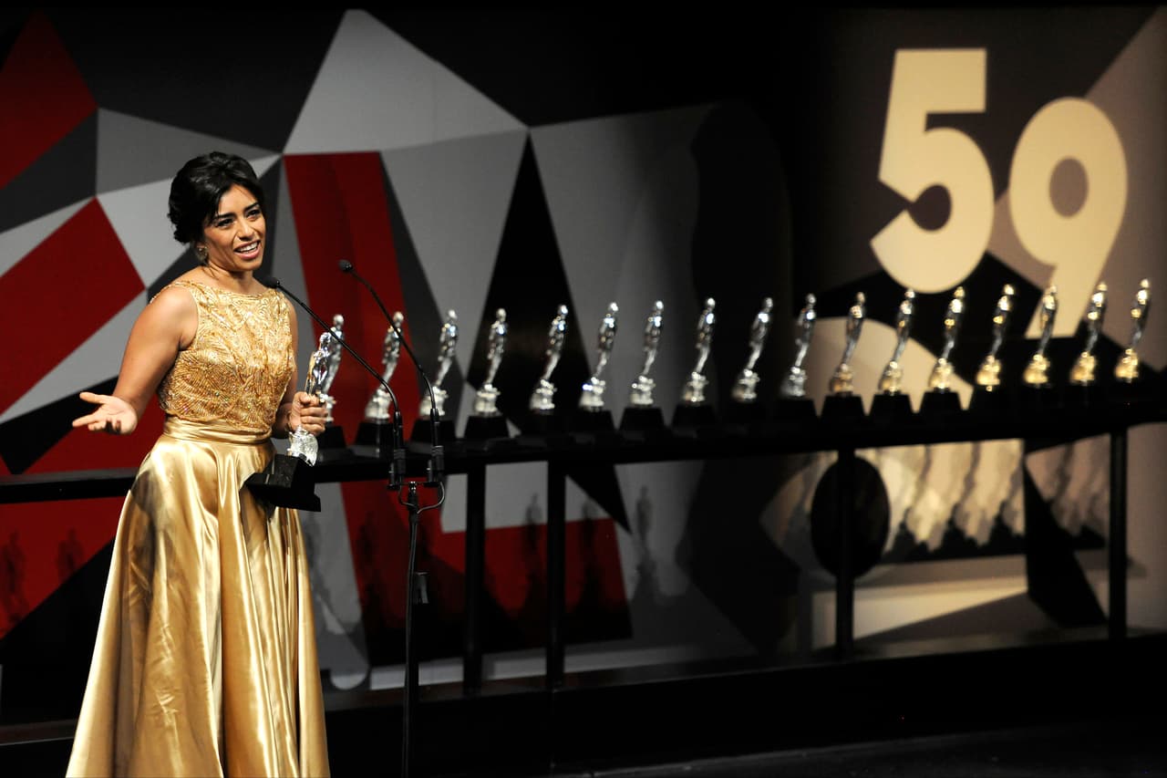 La figura del Ariel es la estatua de un hombre a punto de emprender el vuelo, diseñada por el escultor mexicano Ignacio Asúnsolo. Toma su nombre del libro homónimo del escritor José Enrique Rodó, en el que Ariel es la simbolización de los ideales de unidad y defensa de la cultura latinoamericana.