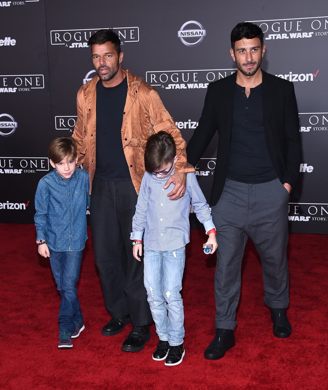 Photo © 2016 Splash News/The Grosby Group Los Angeles, December 10, 2016. Celebs arrive at the 'Rogue One: A Star Wars Story' World Premiere held at the Pantages Theatre in Hollywood, CA. In This Photo: Ricky Martin, Jwan Yosef, Matteo Martin, Valentino Martin