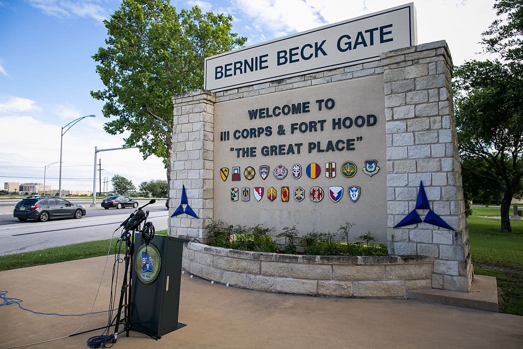 Media outlets gather outside the Bernie Beck gate at Fort Hood, Texas.