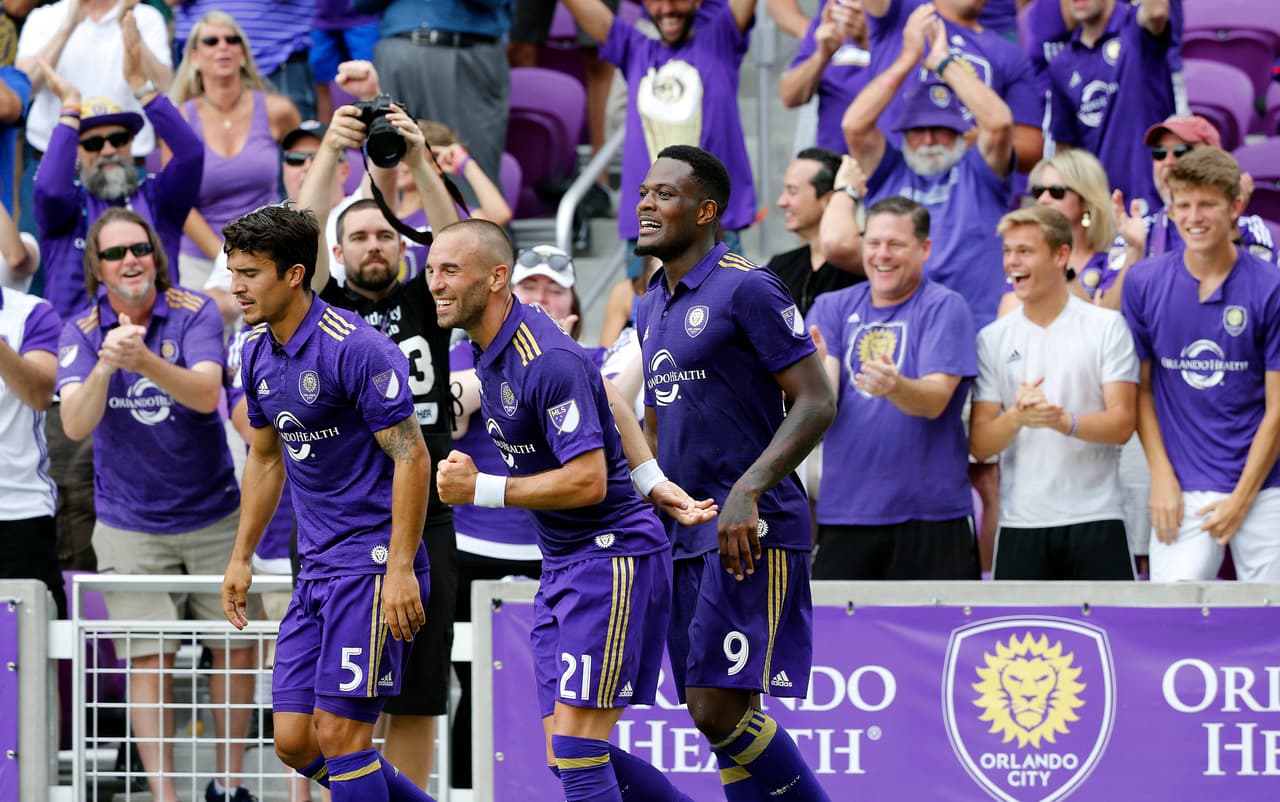 Apr 15, 2017; Orlando, FL, USA; Orlando City SC forward Cyle Larin (9) celebrates after he scored the game winning goal during the second half against the Los Angeles Galaxy at Orlando City Stadium. Orlando City SC defeated the Los Angeles Galaxy 2-1. Mandatory Credit: Kim Klement-USA TODAY Sports